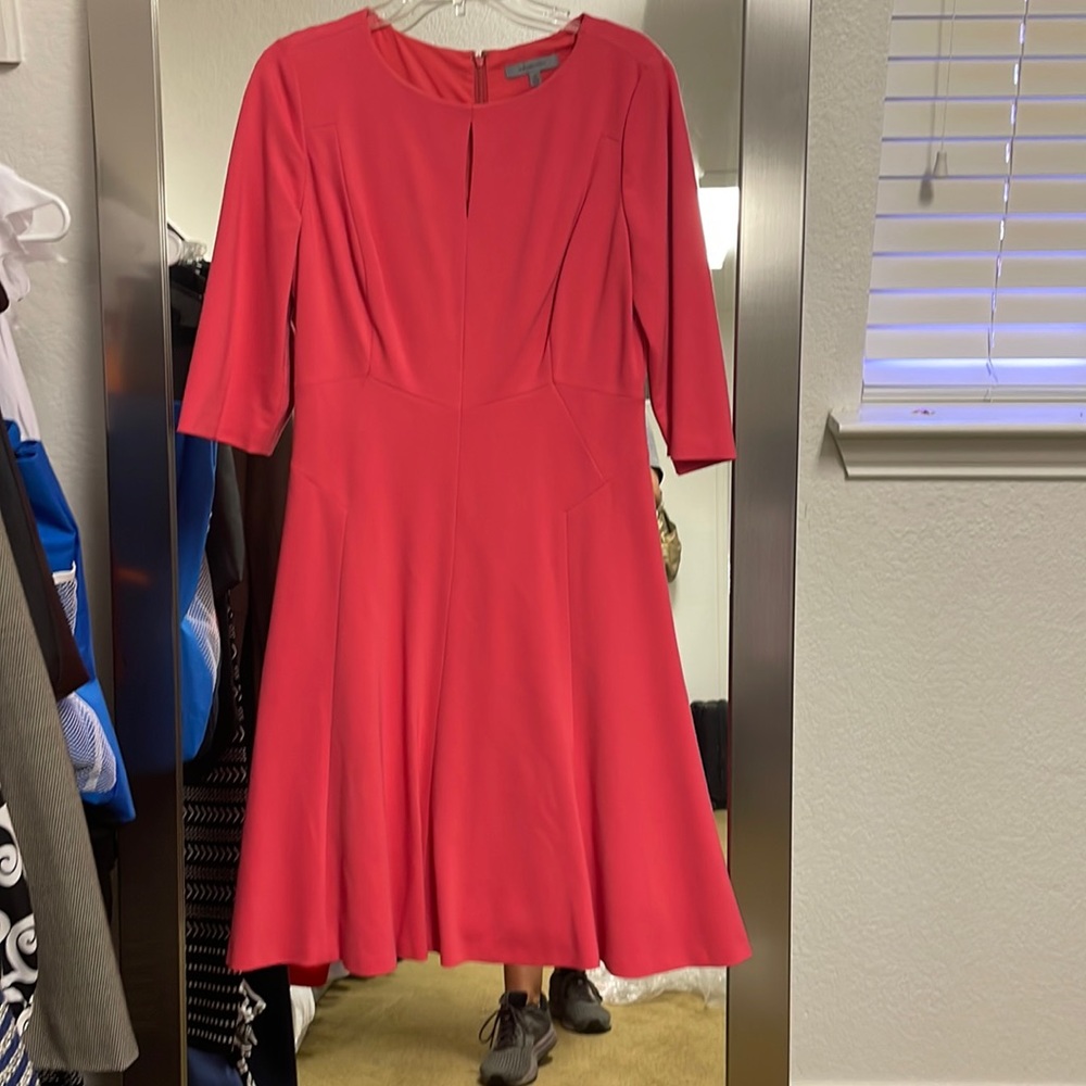 Classic entire dress pink with a key hole at chest.